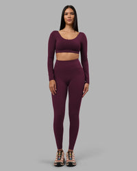 Woman wearing Aria Long Sleeve Sports Bra - Cherry Lacquer | Model:Rhiley | Size:S | Thumbnail Index: 5
