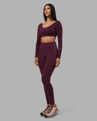 Woman wearing Aria Long Sleeve Sports Bra - Cherry Lacquer | Model:Rhiley | Size:S | Thumbnail Index: 3