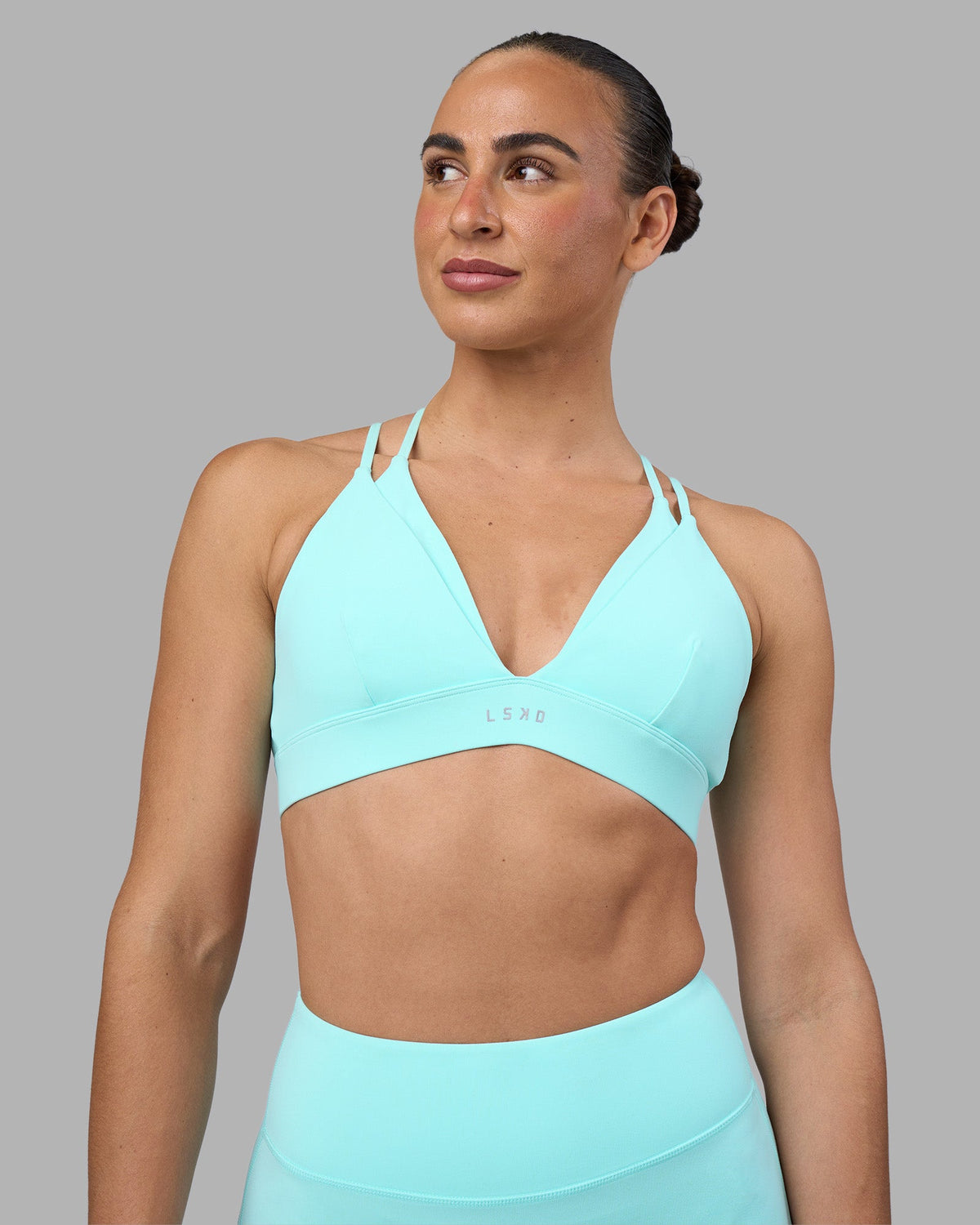 Woman wearing Aria Triangle Sports Bra - Island Paradise | Model:Sophie | Size:S - view 2