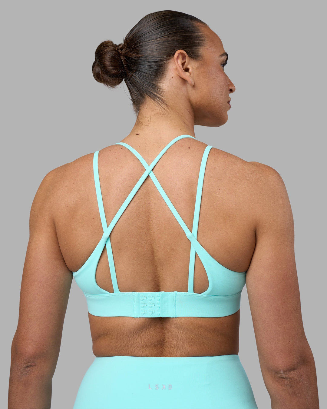 Woman wearing Aria Triangle Sports Bra - Island Paradise | Model:Sophie | Size:S - view 6