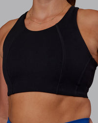 Woman wearing Ascent Sports Bra - Black | Model:Phoebe | Size:S | Thumbnail Index: 5
