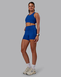 Woman wearing Ascent Sports Bra - Blue Quartz | Model:Phoebe | Size:S | Thumbnail Index: 5
