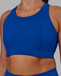Woman wearing Ascent Sports Bra - Blue Quartz | Model:Phoebe | Size:S | Thumbnail Index: 4