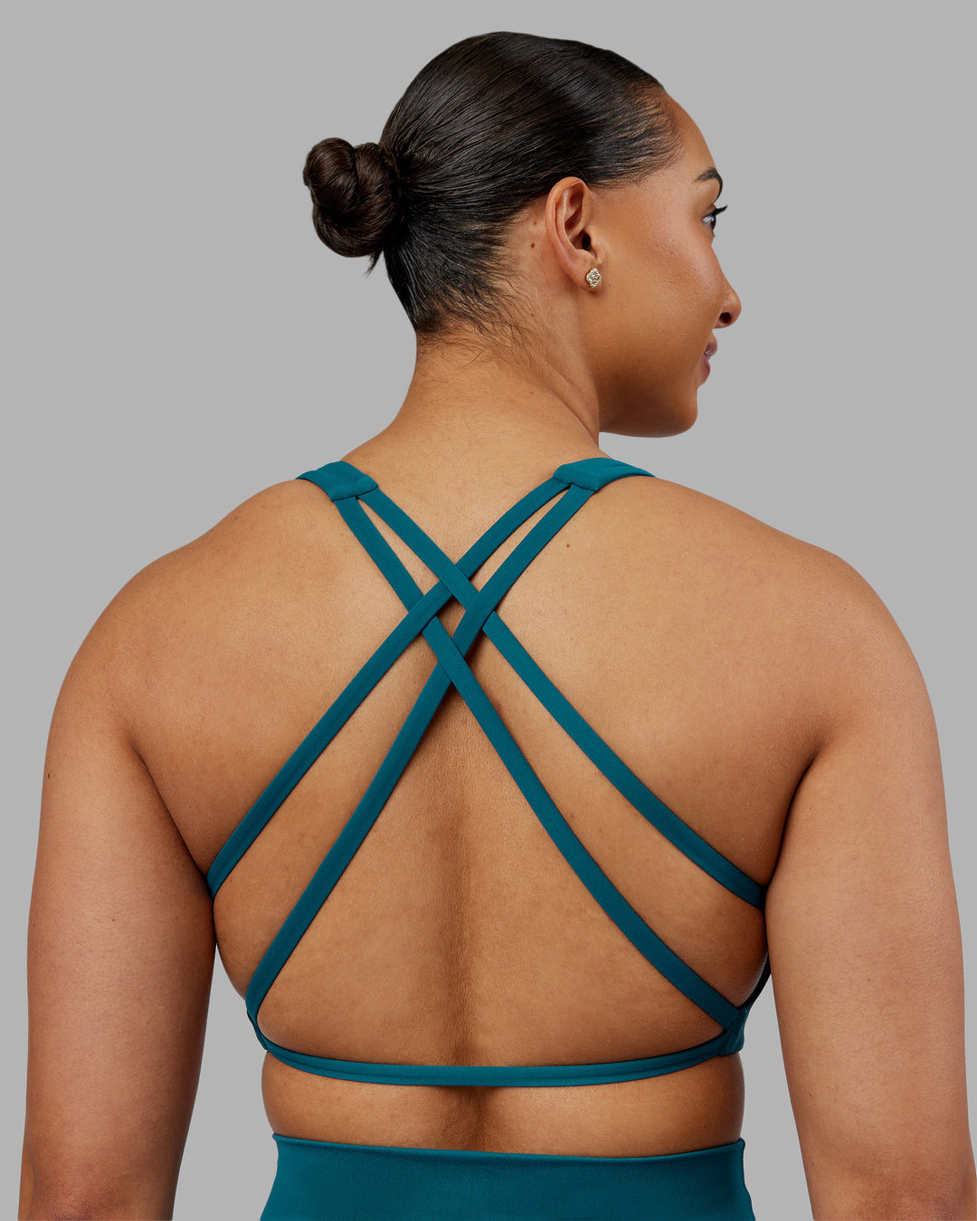 Woman wearing Aspire Sports Bra - Blue Coral | Model:Ayla| Size:S