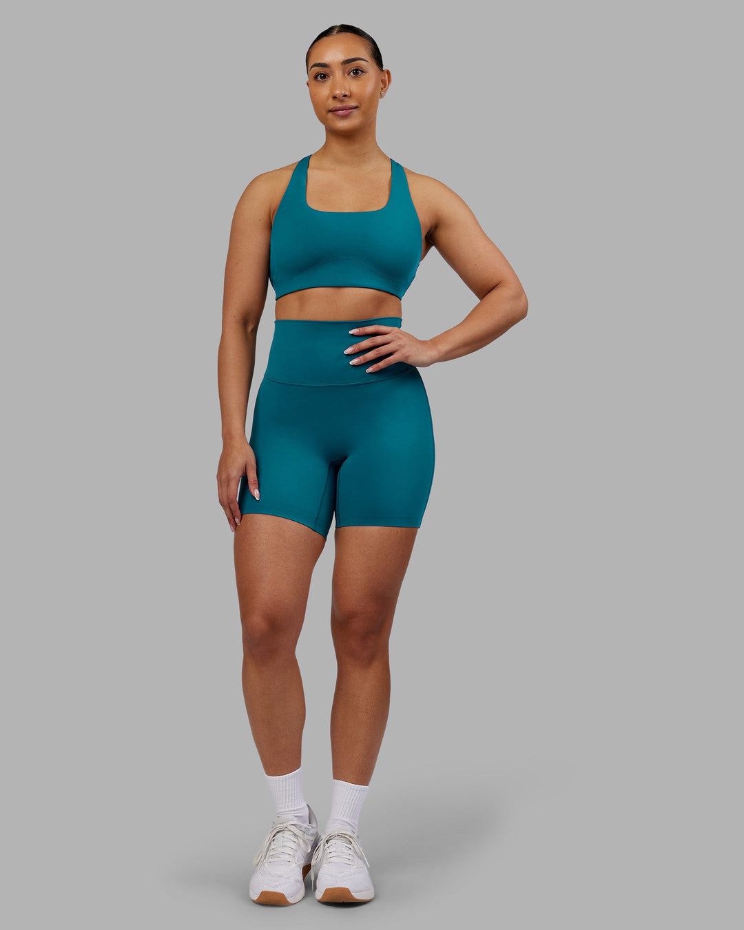 Woman wearing Aspire Sports Bra - Blue Coral | Model:Ayla | Size:S - view 5