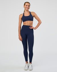 Woman wearing Aspire Sports Bra - Future Navy | Model:Evie | Size:S | Thumbnail Index: 5