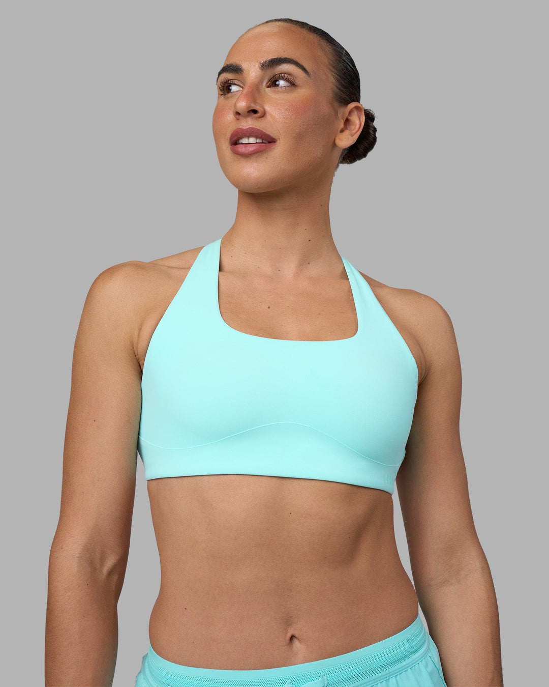 Woman wearing Aspire Sports Bra - Island Paradise | Model:Sophie | Size:S - view 3