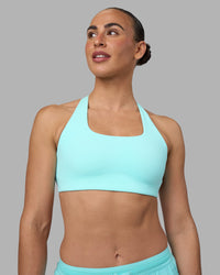 Woman wearing Aspire Sports Bra - Island Paradise | Model:Sophie | Size:S | Thumbnail Index: 2