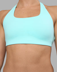 Woman wearing Aspire Sports Bra - Island Paradise | Model:Sophie | Size:S | Thumbnail Index: 7