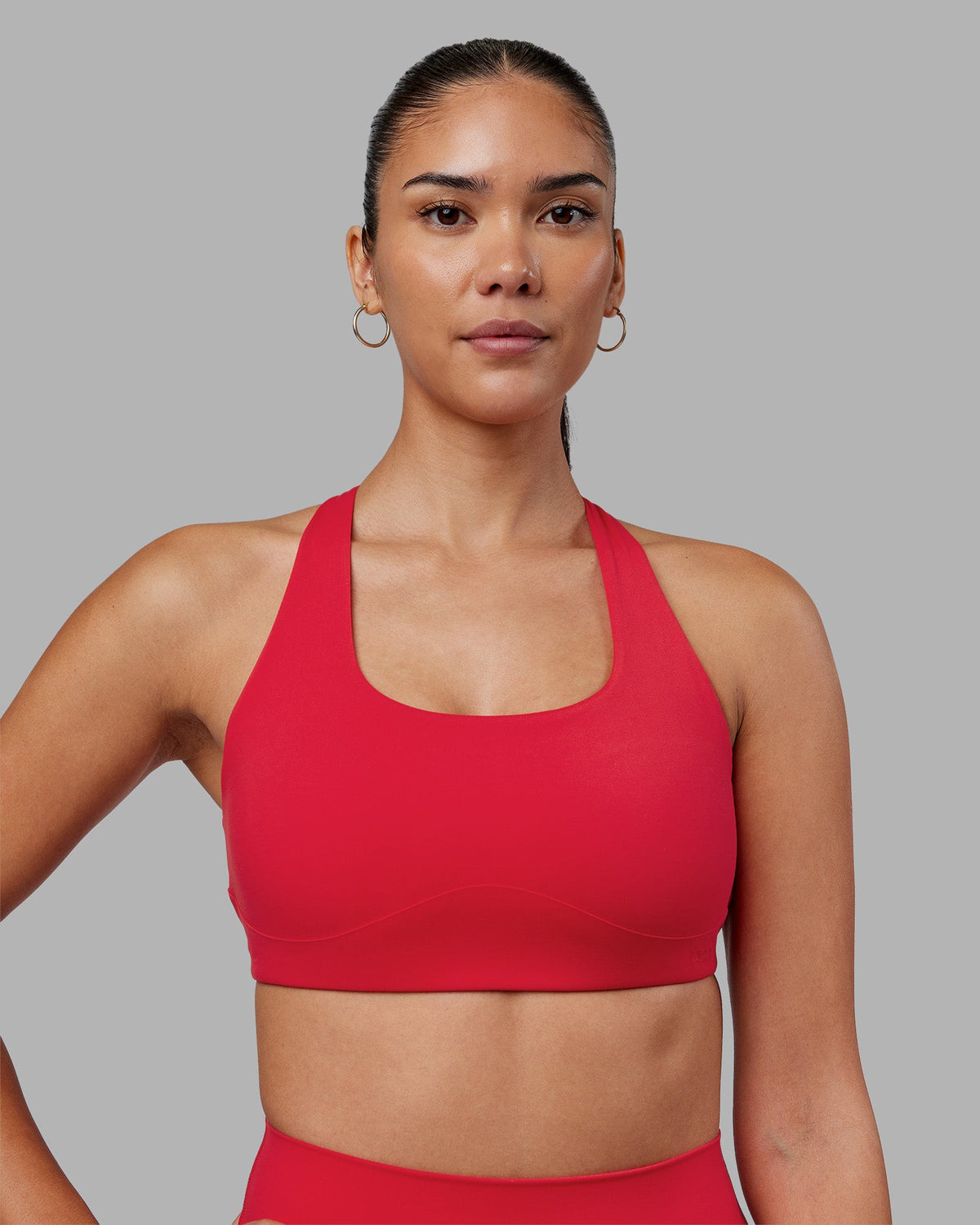 Woman wearing Aspire Sports Bra - Scarlet | Model:Rhiley | Size:S - view 2