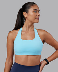 Woman wearing Aspire Sports Bra - Sky Blue | Model:Rhiley | Size:S | Thumbnail Index: 1