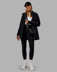 Woman wearing Auxiliary 2.0 Jacket - Black | Model:Ella | Size:S