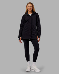 Woman wearing Auxiliary 2.0 Jacket - Black | Model:Ella | Size:S