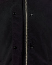 Woman wearing Auxiliary 2.0 Jacket - Black | Model:Ella | Size:S