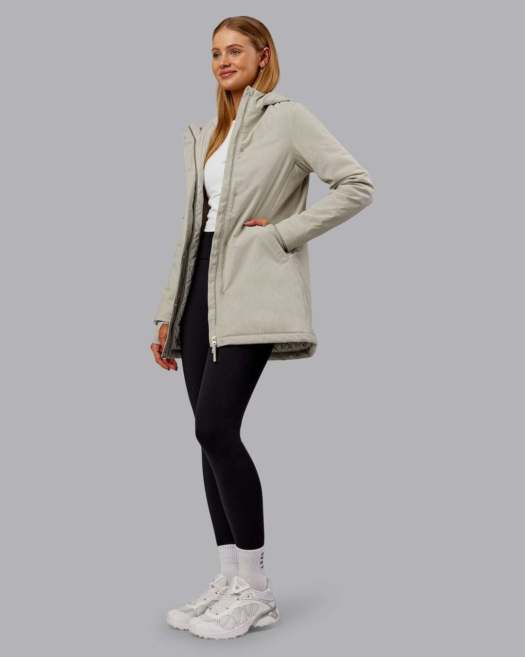 Woman wearing Auxiliary 2.0 Jacket - Shale Beige | Model:Ella | Size:S
