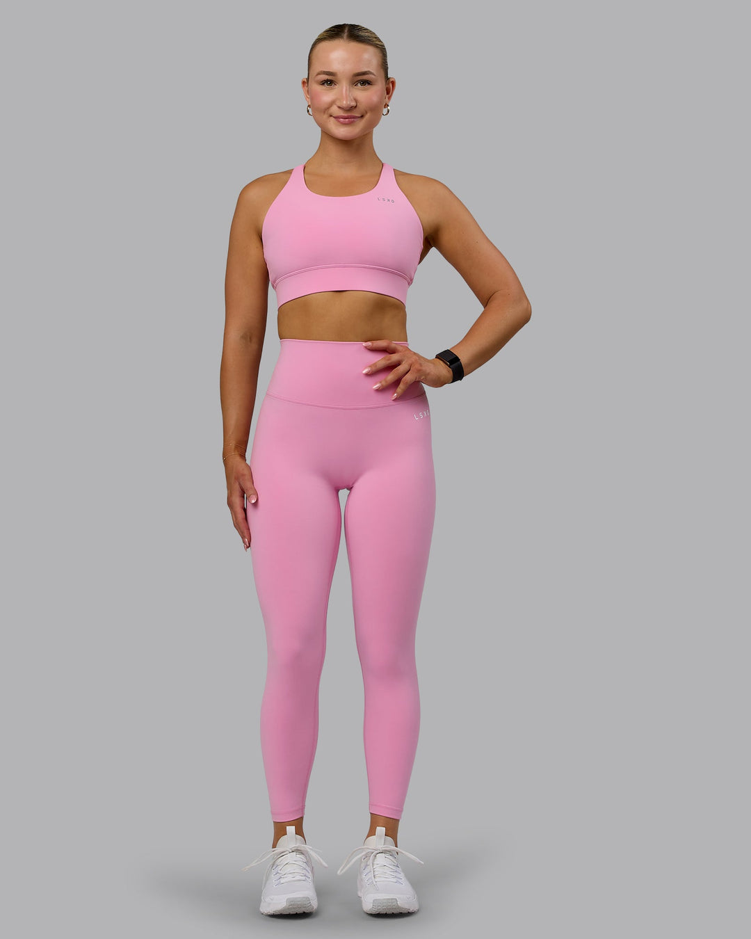 Woman wearing Base 2.0 7/8 Length Tights - Bubblegum