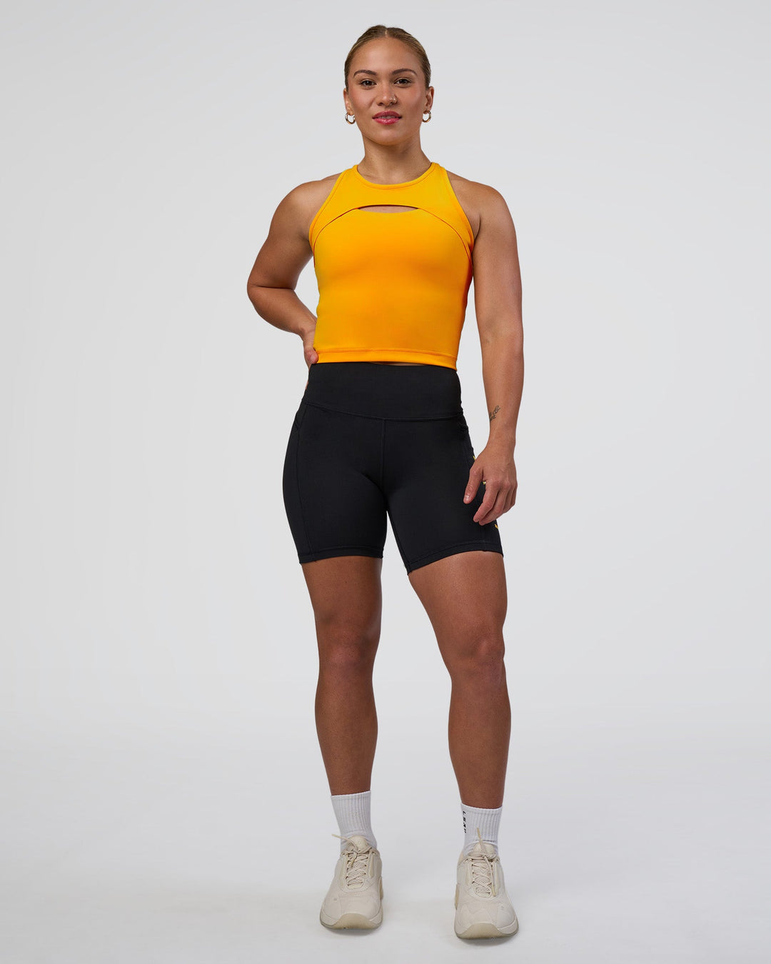 Woman wearing Be Bold Performance Tank - Zinnia | Model:Tenaya | Size:S