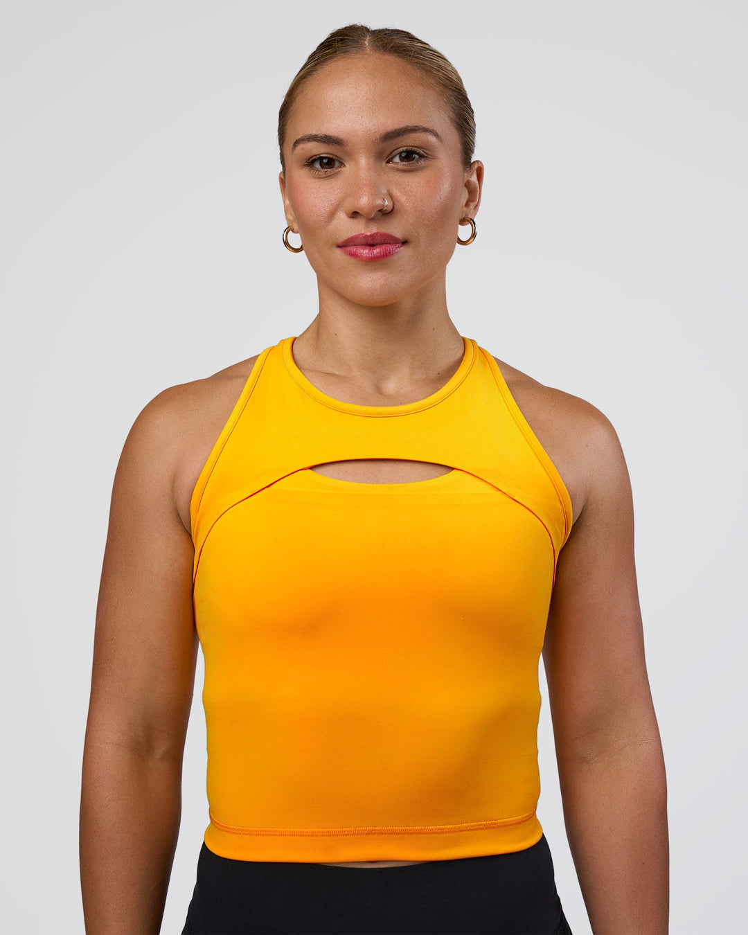Woman wearing Be Bold Performance Tank - Zinnia | Model:Tenaya | Size:S