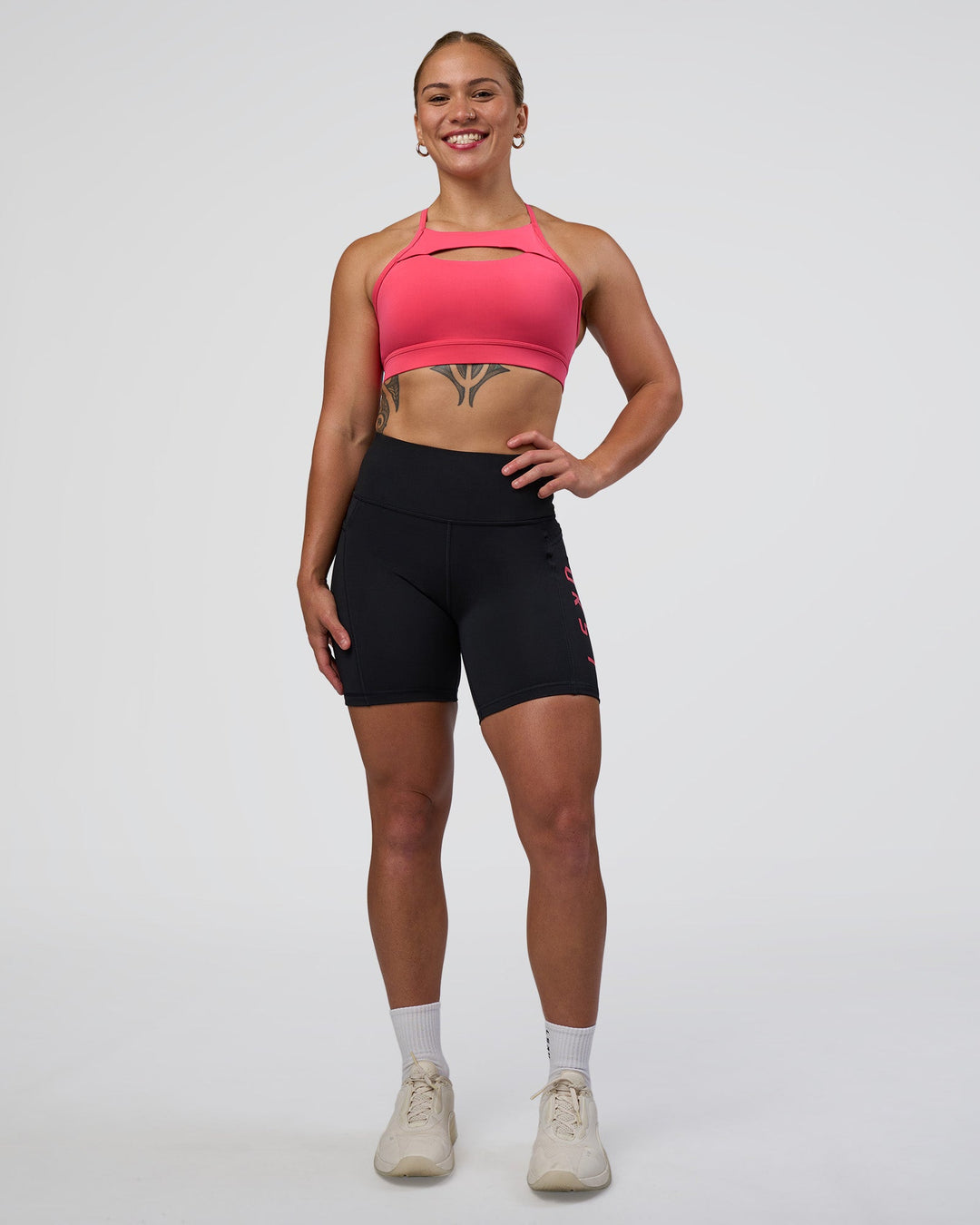 Woman wearing Be Bold Sports Bra - Bright Raspberry | Model:Tenaya | Size:S