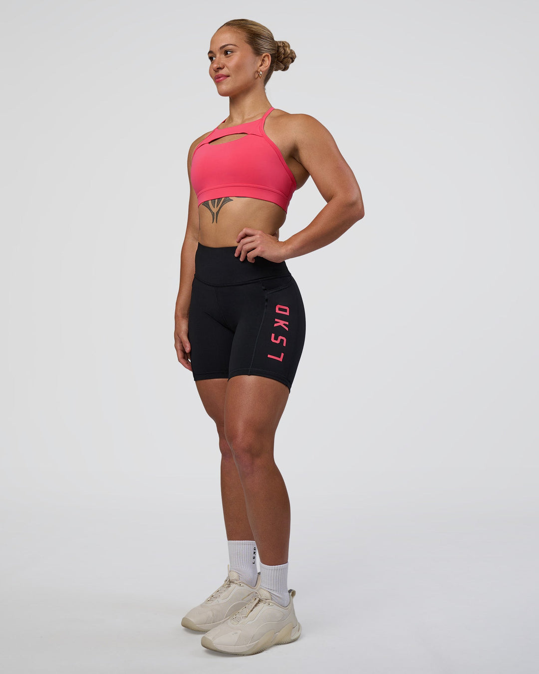 Woman wearing Be Bold Sports Bra - Bright Raspberry | Model:Tenaya | Size:S