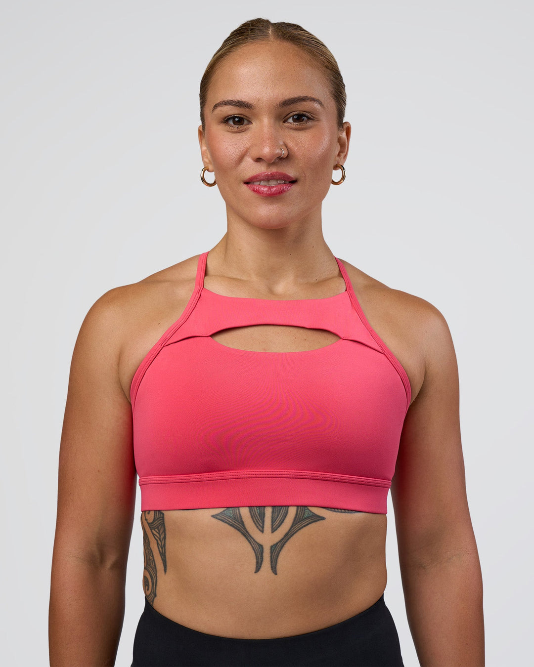 Woman wearing Be Bold Sports Bra - Bright Raspberry | Model:Tenaya | Size:S