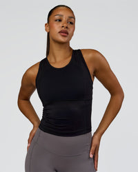 Woman wearing Bend Performance Tank - Black | Model:Rosie | Size:S