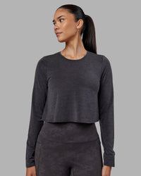 Woman wearing Breeze Long Sleeve Training Tee - Black | Model:Rhiley | Size:S | Thumbnail Index: 1