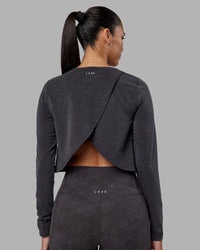 Woman wearing Breeze Long Sleeve Training Tee - Black | Model:Rhiley | Size:S | Thumbnail Index: 0