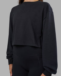 Woman wearing Breeze Open Back Sweater - Black-Black | Model:Phoebe | Size:S | Thumbnail Index: 2