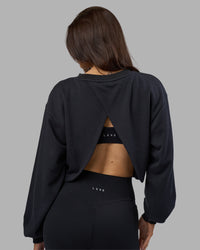 Woman wearing Breeze Open Back Sweater - Black-Black | Model:Phoebe | Size:S | Thumbnail Index: 3