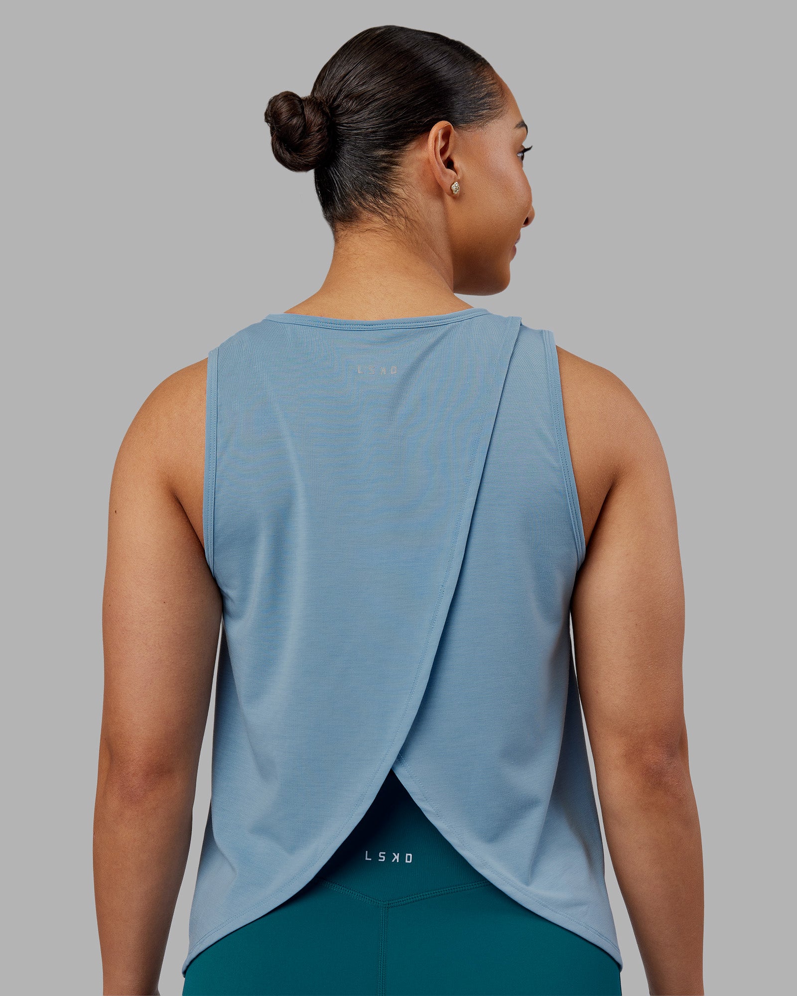 Woman wearing Breeze Training Tank - Glacier Lake | Model:Ayla | Size:S
