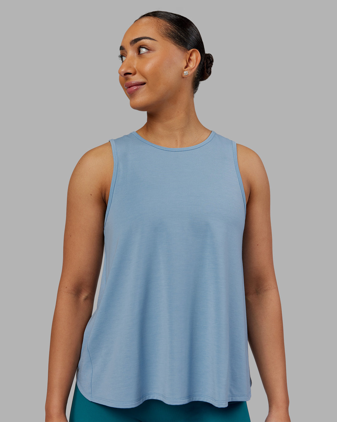 Woman wearing Breeze Training Tank - Glacier Lake | Model:Ayla | Size:S