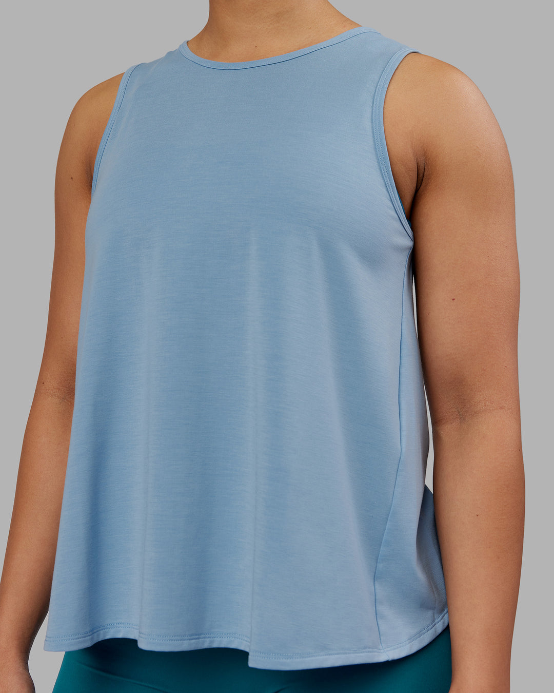 Woman wearing Breeze Training Tank - Glacier Lake | Model:Ayla | Size:S