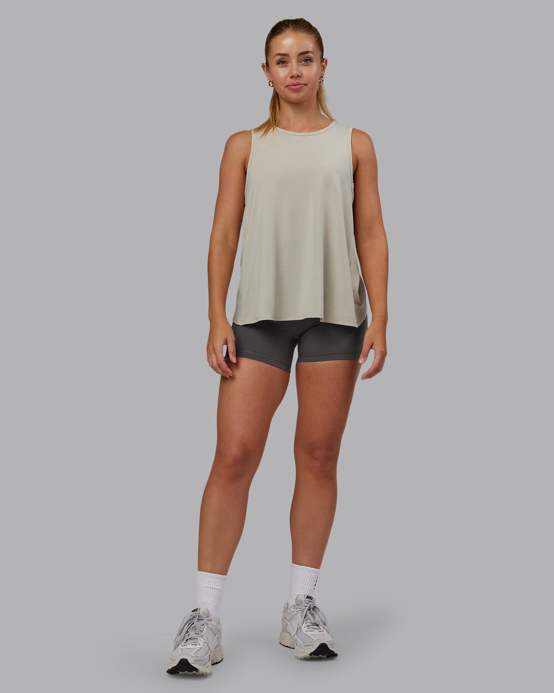 Woman wearing Breeze Training Tank - Shale Beige | Model:Hannah | Size:S