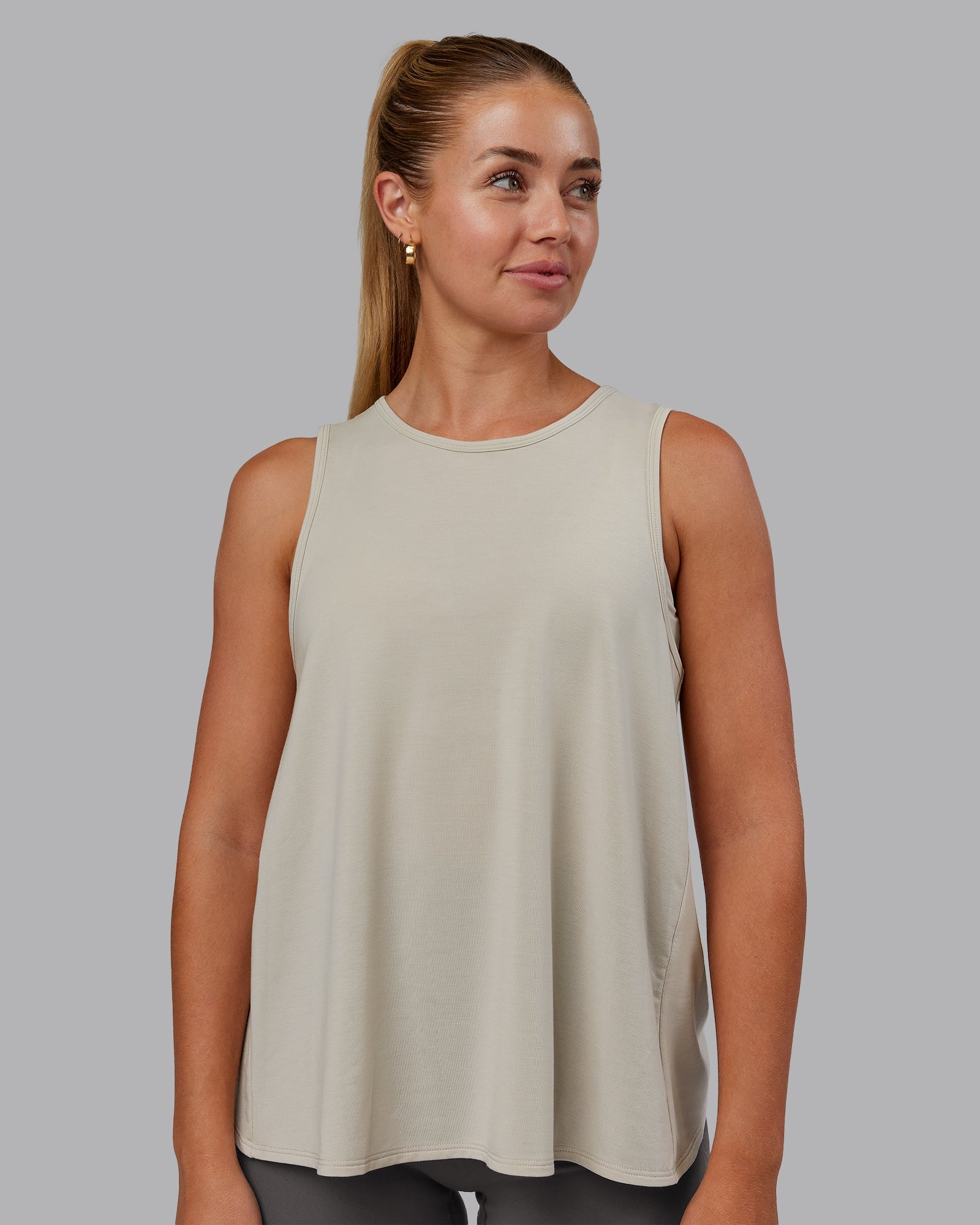 Woman wearing Breeze Training Tank - Shale Beige | Model:Hannah | Size:S