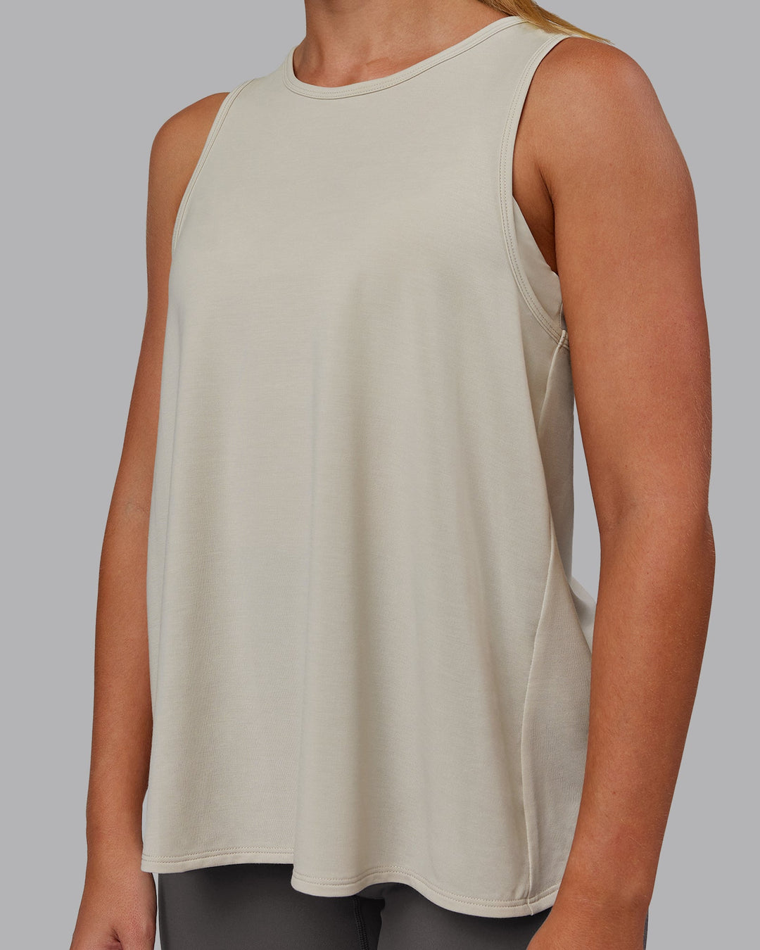 Woman wearing Breeze Training Tank - Shale Beige | Model:Hannah | Size:S
