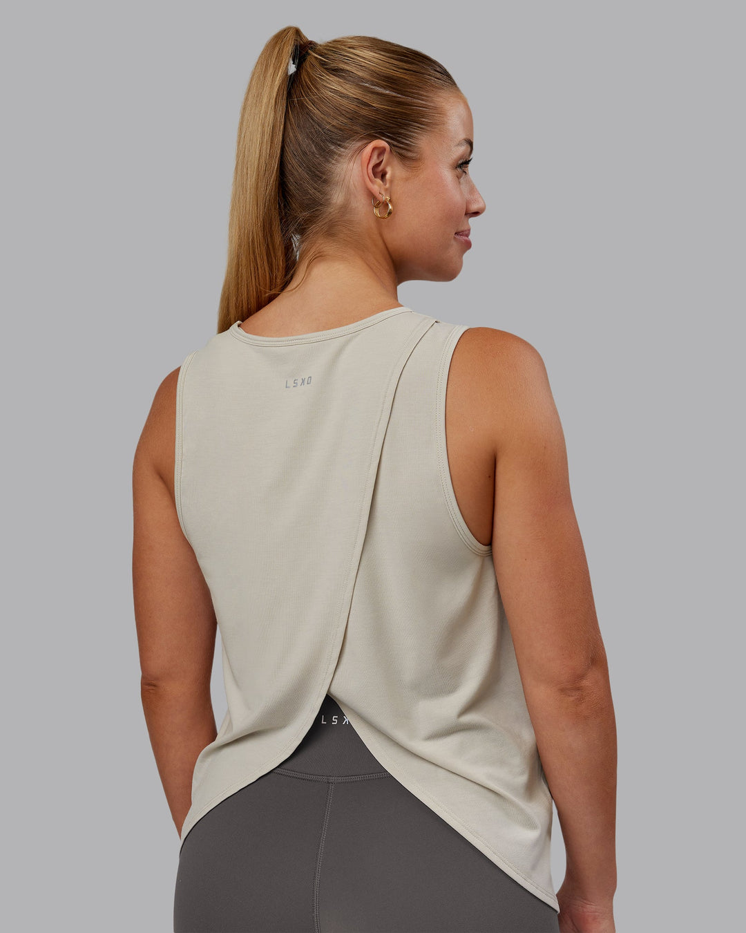 Woman wearing Breeze Training Tank - Shale Beige | Model:Hannah | Size:S