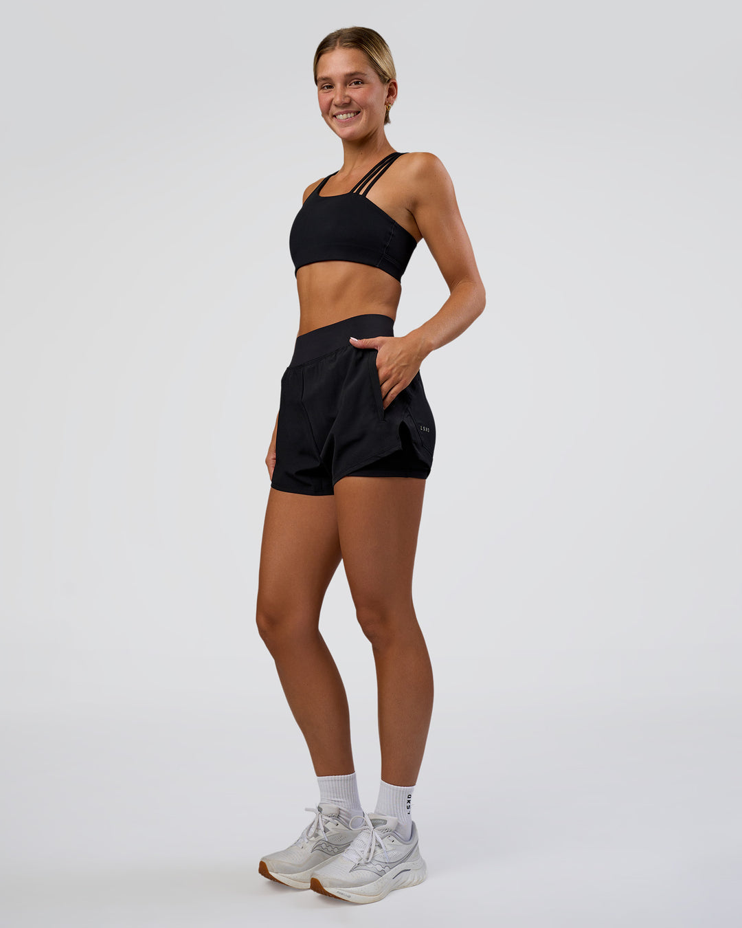 Woman wearing Challenger 3&quot; Lined Performance Short - Black | Model:Amity | Size:S