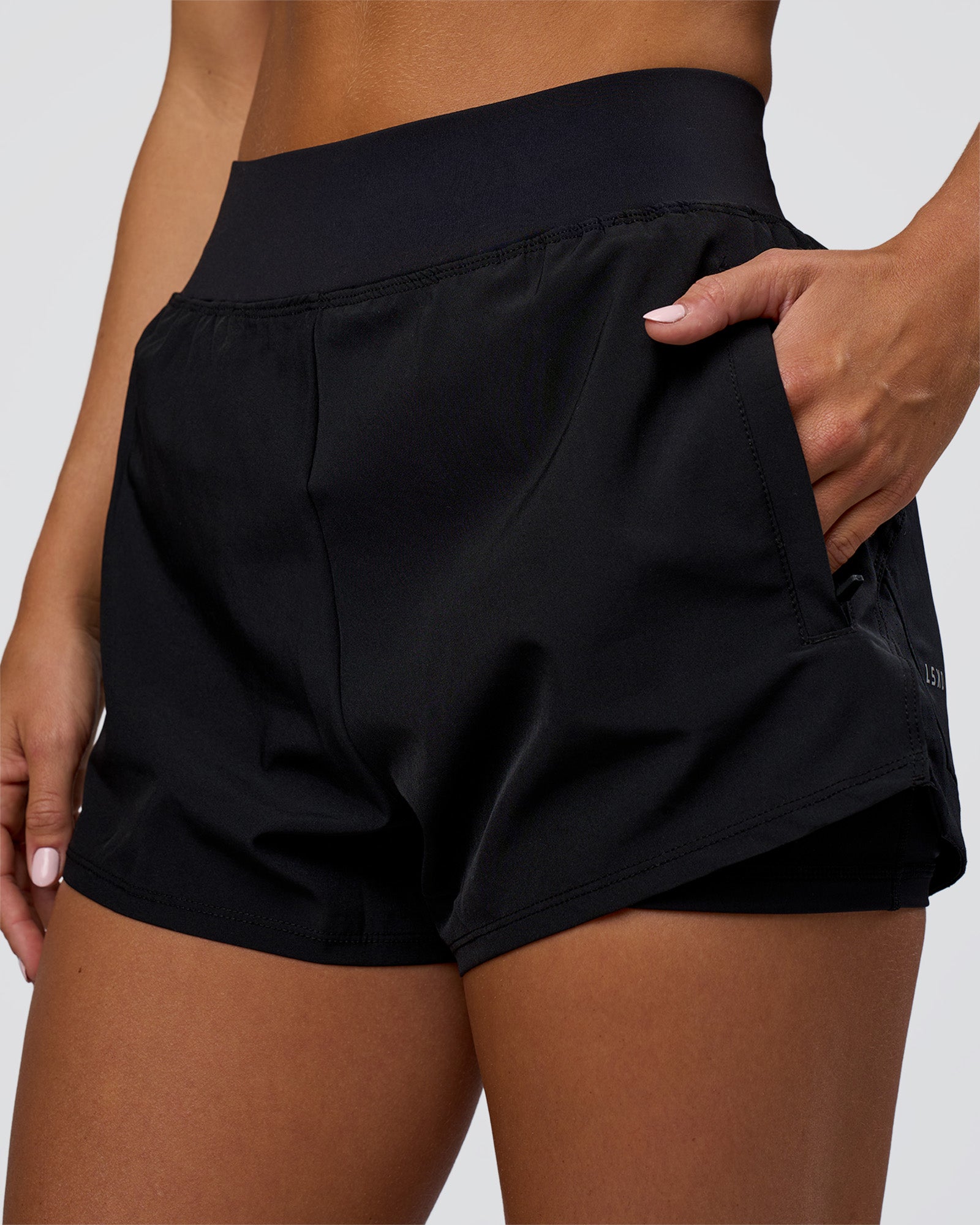 Woman wearing Challenger 3" Lined Performance Short - Black | Model:Amity | Size:S