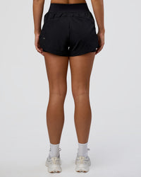 Woman wearing Challenger 3" Lined Performance Short - Black | Model:Amity | Size:S