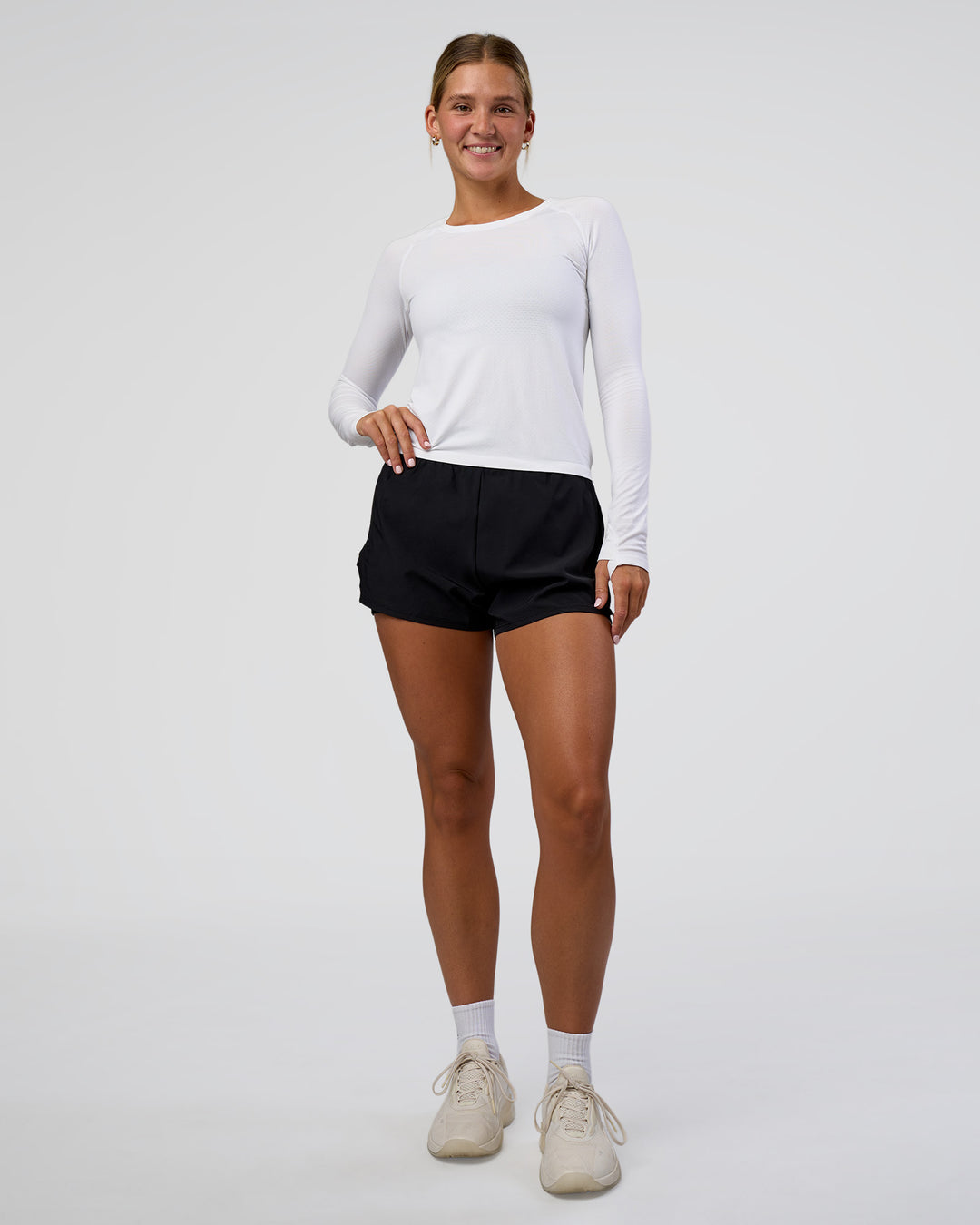 Woman wearing Challenger 3&quot; Lined Performance Short - Black | Model:Amity | Size:S