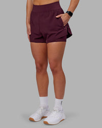 Woman wearing Challenger 3" Lined Performance Short - Cherry Lacquer | Model:Keisha | Size:S