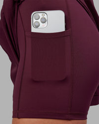 Woman wearing Challenger 3" Lined Performance Short - Cherry Lacquer | Model:Keisha | Size:S