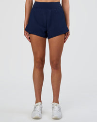 Woman wearing Challenger 3" Lined Performance Short - Future Navy | Model:Evie | Size:S