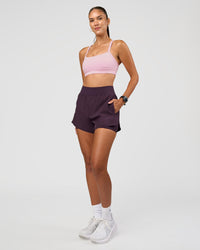 Woman wearing Challenger 3" Lined Performance Short - Midnight Plum | Model:Rhiley | Size:S