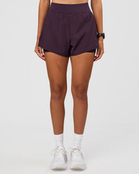 Woman wearing Challenger 3" Lined Performance Short - Midnight Plum | Model:Rhiley | Size:S