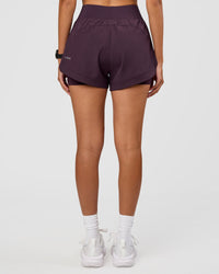 Woman wearing Challenger 3" Lined Performance Short - Midnight Plum | Model:Rhiley | Size:S