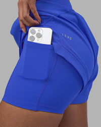 Woman wearing Challenger 3" Lined Performance Short - Power Cobalt | Model:Rhiley | Size:S