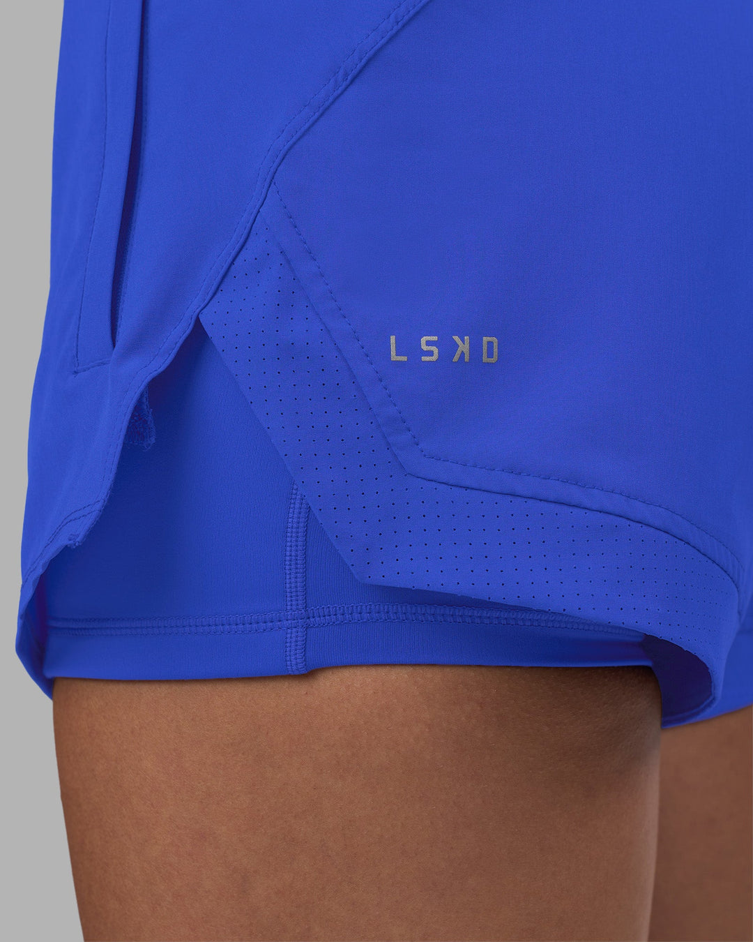 Woman wearing Challenger 3&quot; Lined Performance Short - Power Cobalt | Model:Rhiley | Size:S