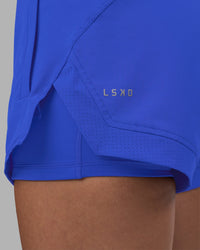 Woman wearing Challenger 3" Lined Performance Short - Power Cobalt | Model:Rhiley | Size:S